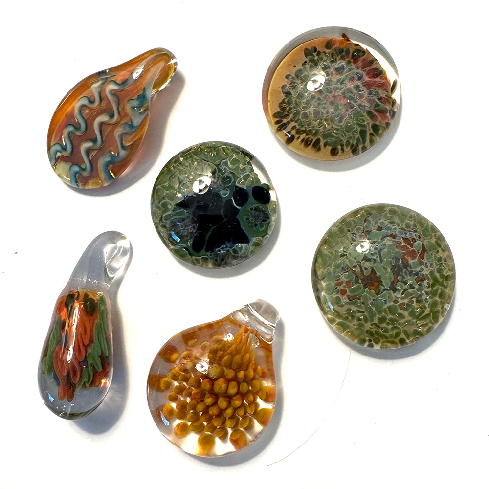 Six hand-blown glass stones and pendants assortment